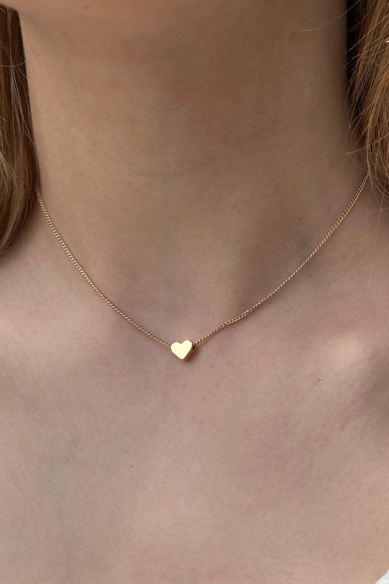 Brandy Melville GOLD SACRED HEART NECKLACE Worn by Taehyung Price : 1100  including US agent fee The price is excluding domestic US shi... | Instagram